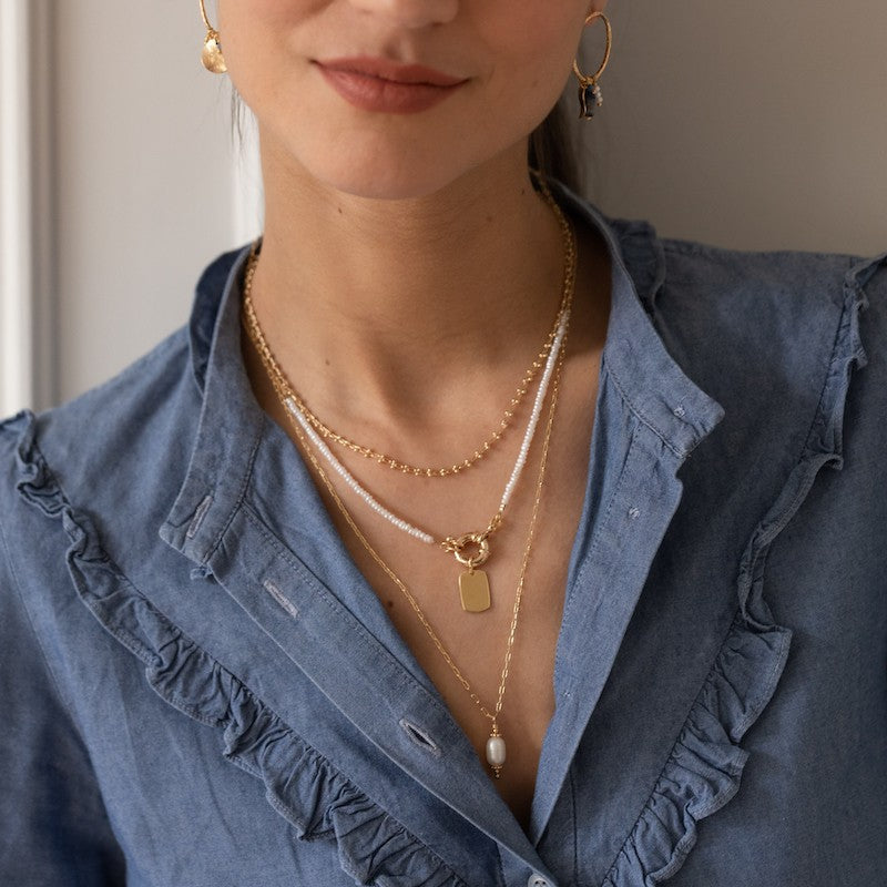 Collier plaque or maxime blanc