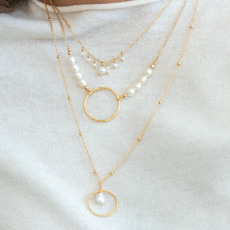 Collier plaque or appolin