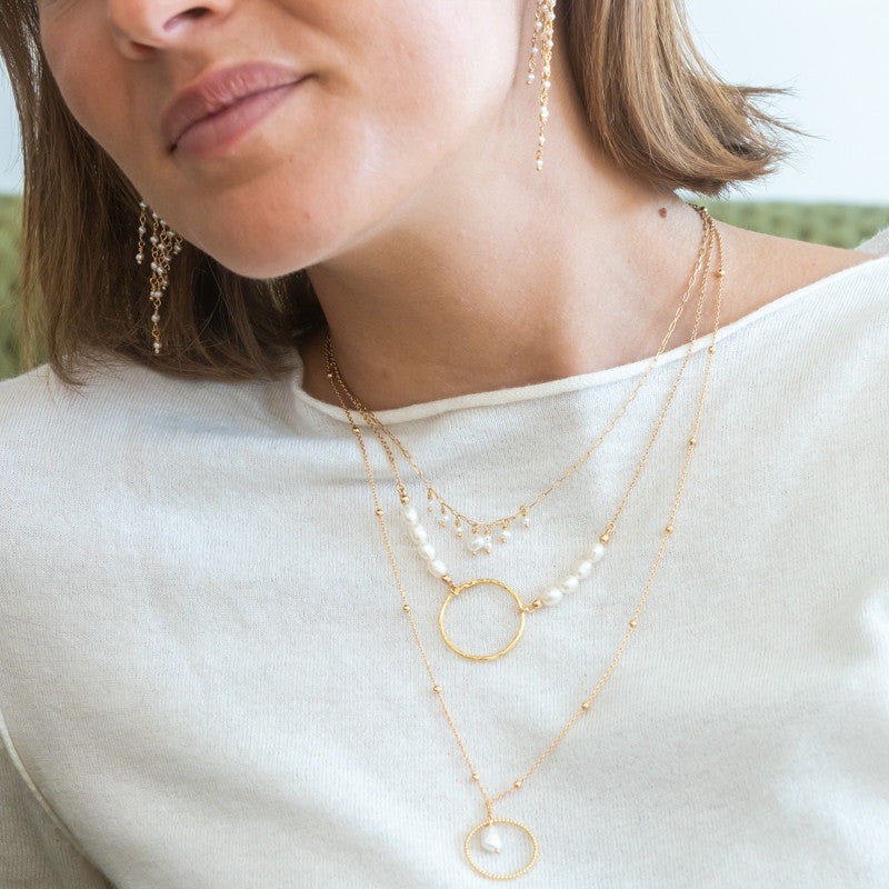 Collier plaque or appolin