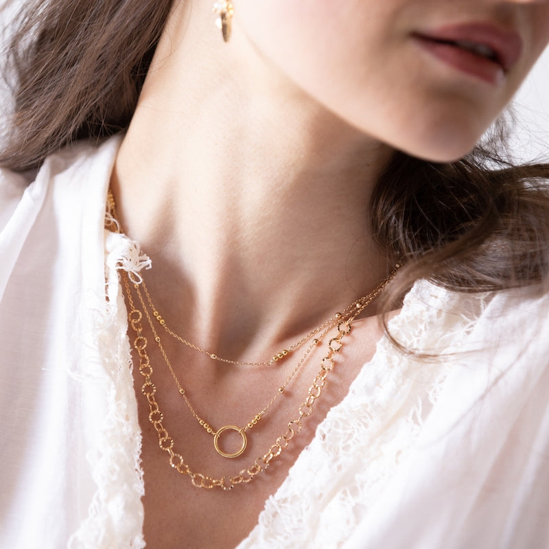 Collier plaque or estelle