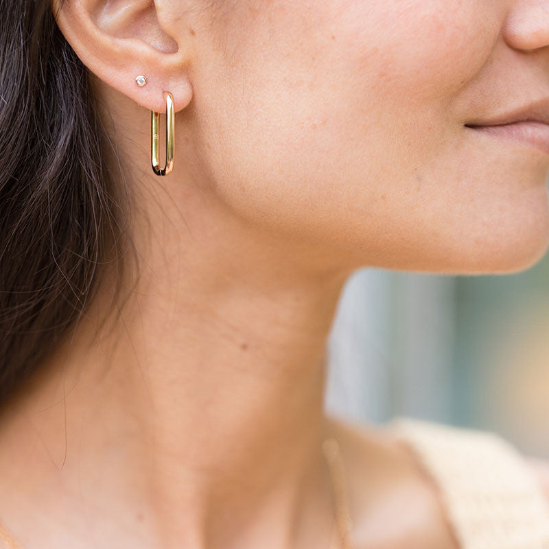 Boucle oreille plaque or hugues unite